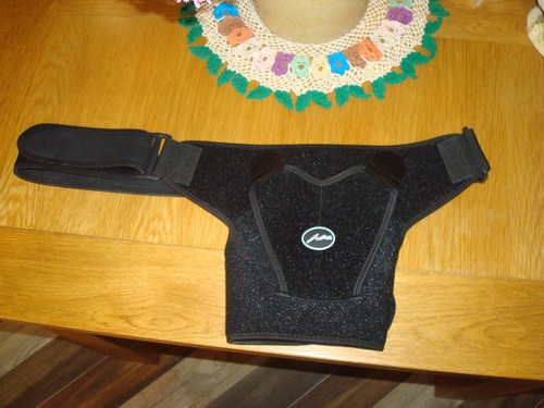 Shoulder brace with heat - brace,